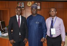 Minister of State for Budget and National Planning, Prince Clem Ikanade Agba with Mr Matthew Omotosho (ICT Teacher) on the left and Mr Kinsley David Adaigbe (Basic Technology Teacher) on the right, who both led some students of Whitesands School, Lekki, Lagos, on a courtesy visit to the minister in Abuja on Wednesday, February 5, 2020. Photo: MBNP