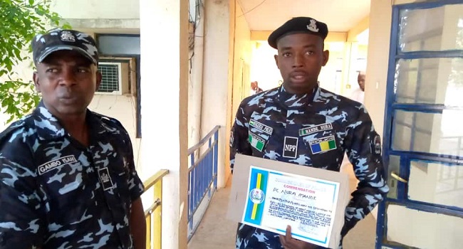Police honour officer for returning missing dollars to owner