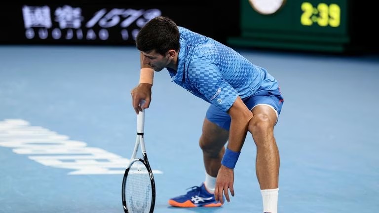 Injured hamstring major headache for Djokovic in De Minaur test