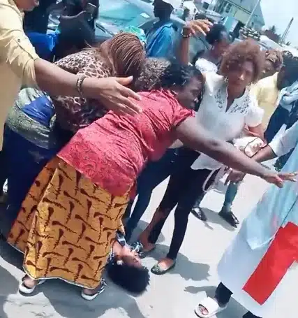 Naira Scarcity: Confusion as pregnant woman goes into labour while queuing for cash at a bank (+video)