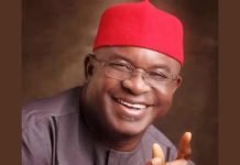 Roland Owie felicitates David Mark on 75th birthday