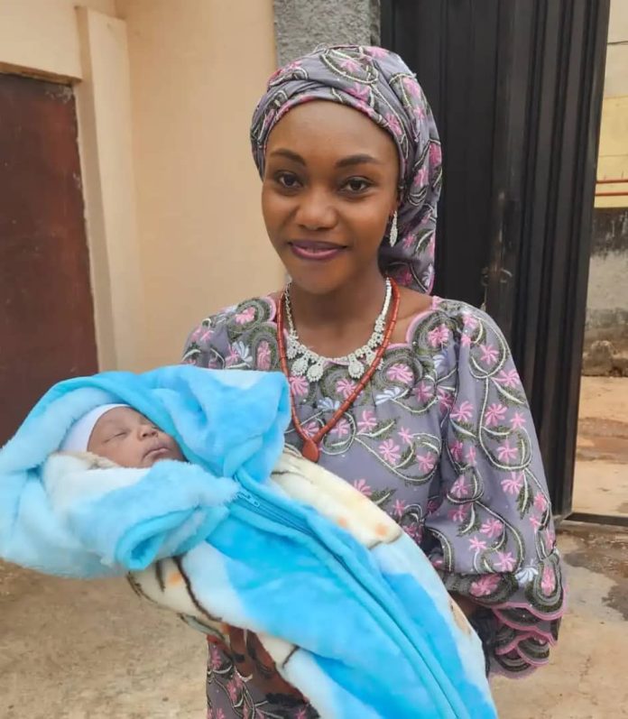 Hafsat Ibrahim and baby during the naming ceremony