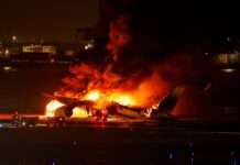 Developing: Plane bursts into flames after landing in Japan