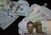Naira gains, exchanges at N1,382 against dollar