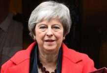 British ex-PM Theresa May quits parliament after 27 years