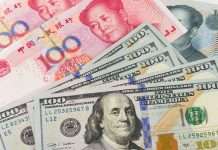 Yuan weakens to 7.1498 against dollar