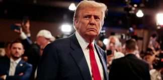 Georgia court dismisses two more charges against Trump