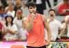 Alcaraz wins in 56 minutes as ‘China’s Nadal’ extends fairytale