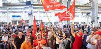 Volkswagen staff protest potential plant closures, wage cuts at key meeting