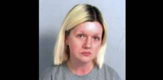 British woman who killed her parents and lived with their bodies is sentenced to life
