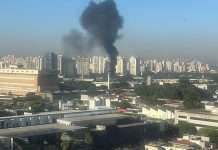 At least two dead as plane crashes into vehicles