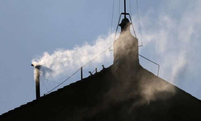 White smoke rises from the chimney on the Sistine Chapel, indicating that a new pope has been elected at the Vatican, May 8, 2025.