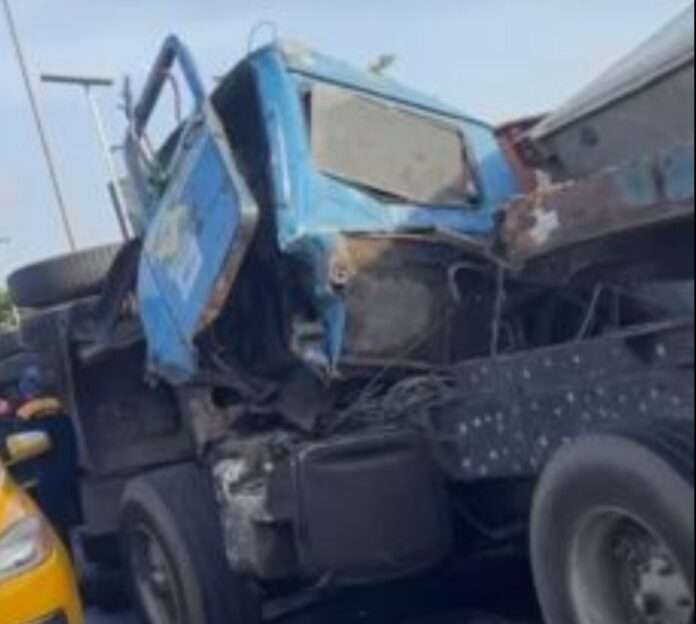 Two trucks collide, crush two dispatch riders on Eko Bridge