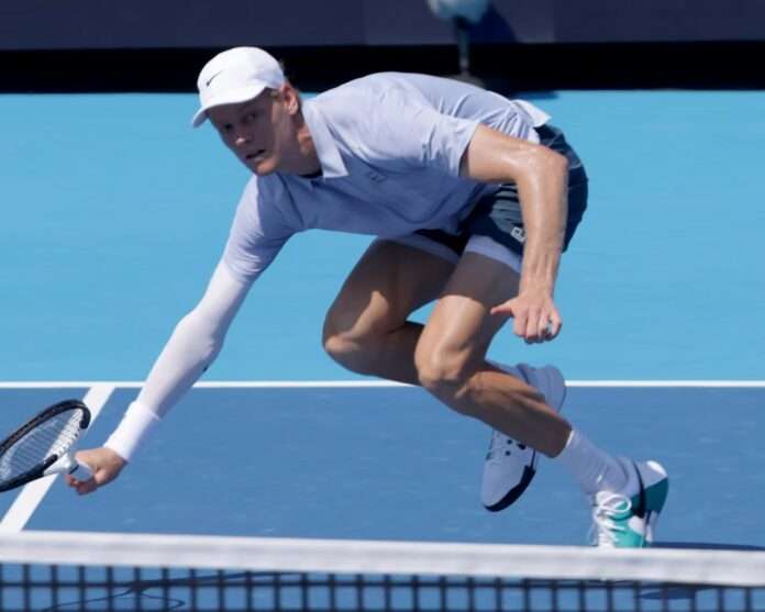 Jannik Sinner stretches to reach the ball during his victory against Terence Atmane in the semi-final of the Cincinnati Open.