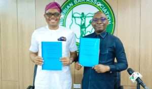 R-L: Director-General, Bureau of Public Procurement (BPP), Dr. Adebowale A. Adedokun, FCIPS, ACFE and President, Nigerian Bar Association (NBA) Mazi Afam Osigwe, SAN displaying copies of the signed MoU at the NBA Headquarters in Abuja