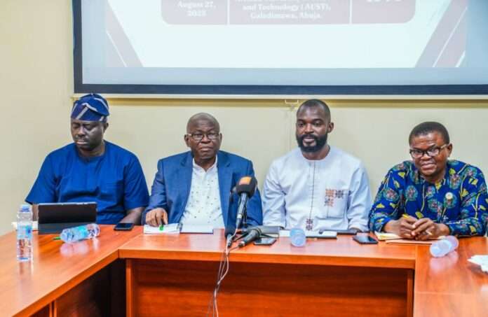 L-R:Member of the Local Organizing Committee, and Director of Information, New Media and Protocol, National Agency for Science and Engineering Infrastructure (NASENI), Mr. Olusegun Ayeoyenikan; President, African University of Science and Technology (AUST), Professor Azikiwe Peter Onwualu; Chairman, Local Organization Committee, Dr. Bosco Okolo-Obi; and Publisher, Africa Science and Technology Magazine, Bonny Alams at a press conference to announce the inaugural National Conference on Science, Technology and Innovation Communication (STICOMMSLOC) in Abuja on Wednesday, August 27, 2025.