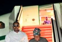Tinubu returns to Abuja after vacation in France