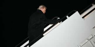 Trump’s Davos trip delayed as plane makes emergency return to US