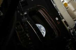 A glimpse of Earth can be seen from inside the Orion capsule. NASA