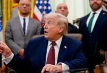 Ships report attacks after Iran closes Strait of Hormuz, as Trump says US ‘won’t be blackmailed’